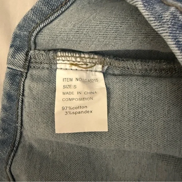 Light blue denim vest with buckle details on the sides - Picture 8 of 8